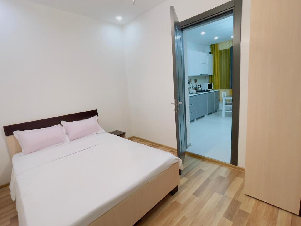 Postel nebo postele na pokoji v ubytování Maria House