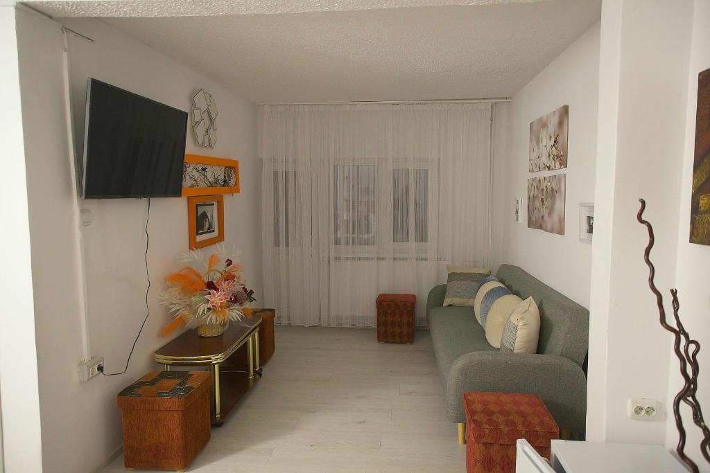 TV a/nebo společenská místnost v ubytování Casa Mina