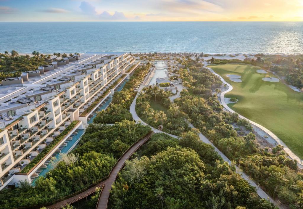 an aerial view of a resort with the ocean in the background at Atelier Playa Mujeres- Adults Only - All Inclusive Resort in Cancún