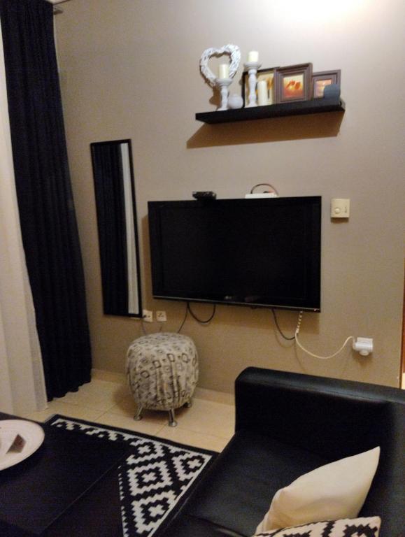 TV a/nebo společenská místnost v ubytování volos888