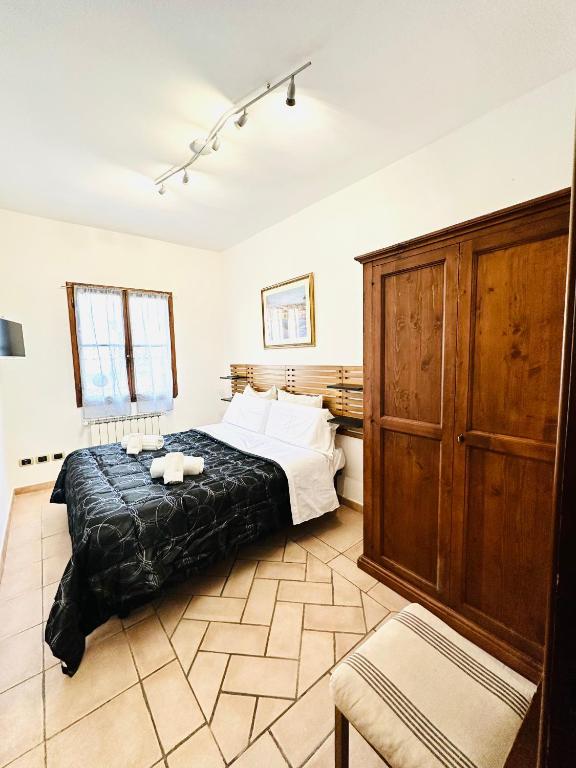 A bed or beds in a room at Home Cavour Florence