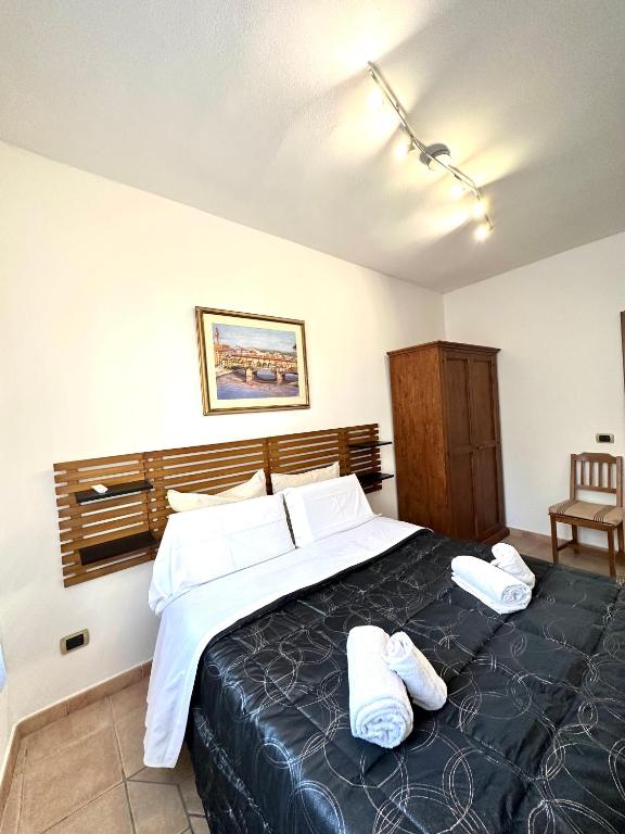 A bed or beds in a room at Home Cavour Florence