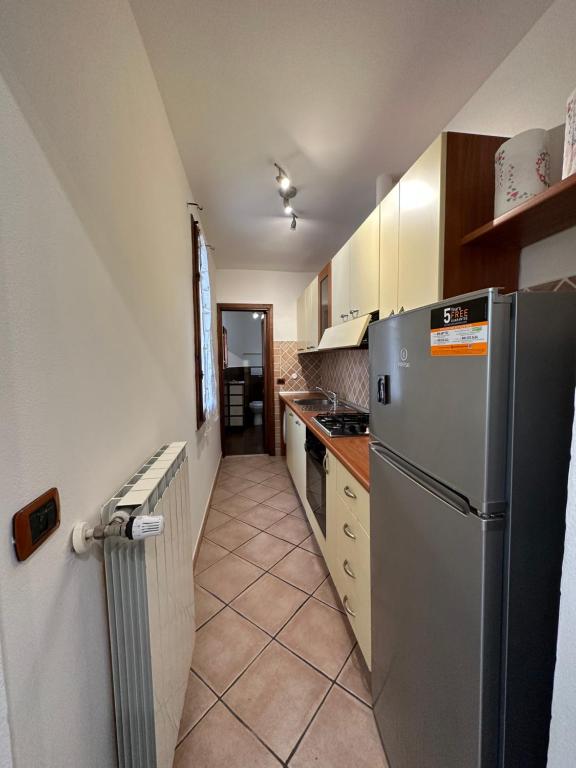 A kitchen or kitchenette at Home Cavour Florence