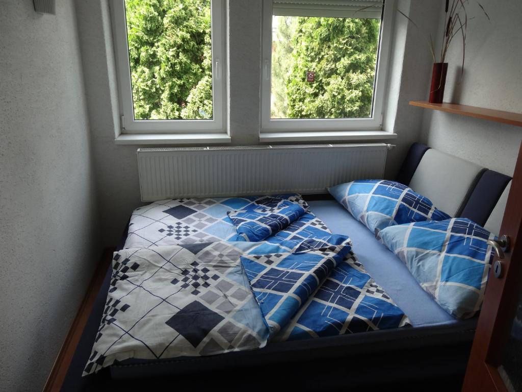 Postel nebo postele na pokoji v ubytování Chata Triomint