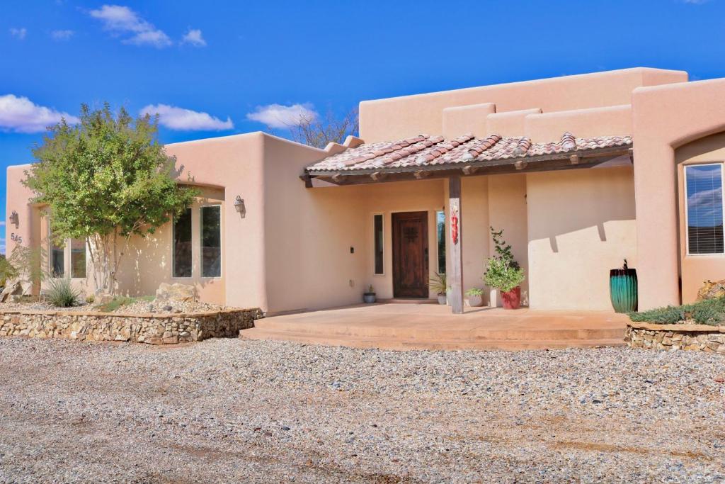 a house with a driveway in front of it at Southwestern Comfort Stay 2B in Las Cruces