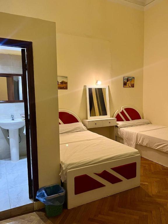 Postel nebo postele na pokoji v ubytování Philo Hotel