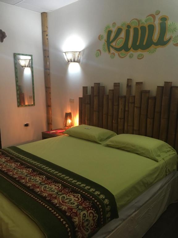 Postel nebo postele na pokoji v ubytování CASITA MADAME