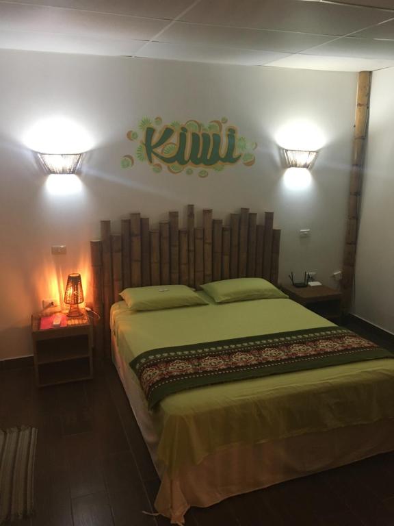 Postel nebo postele na pokoji v ubytování CASITA MADAME
