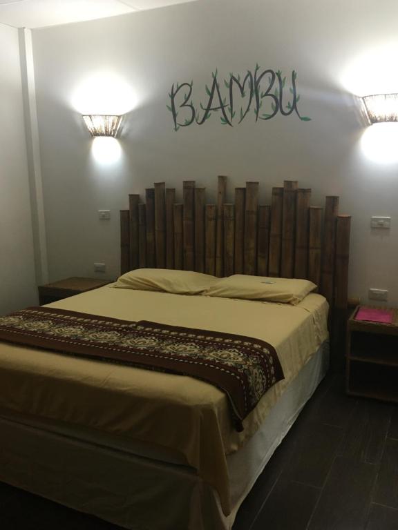 Postel nebo postele na pokoji v ubytování CASITA MADAME