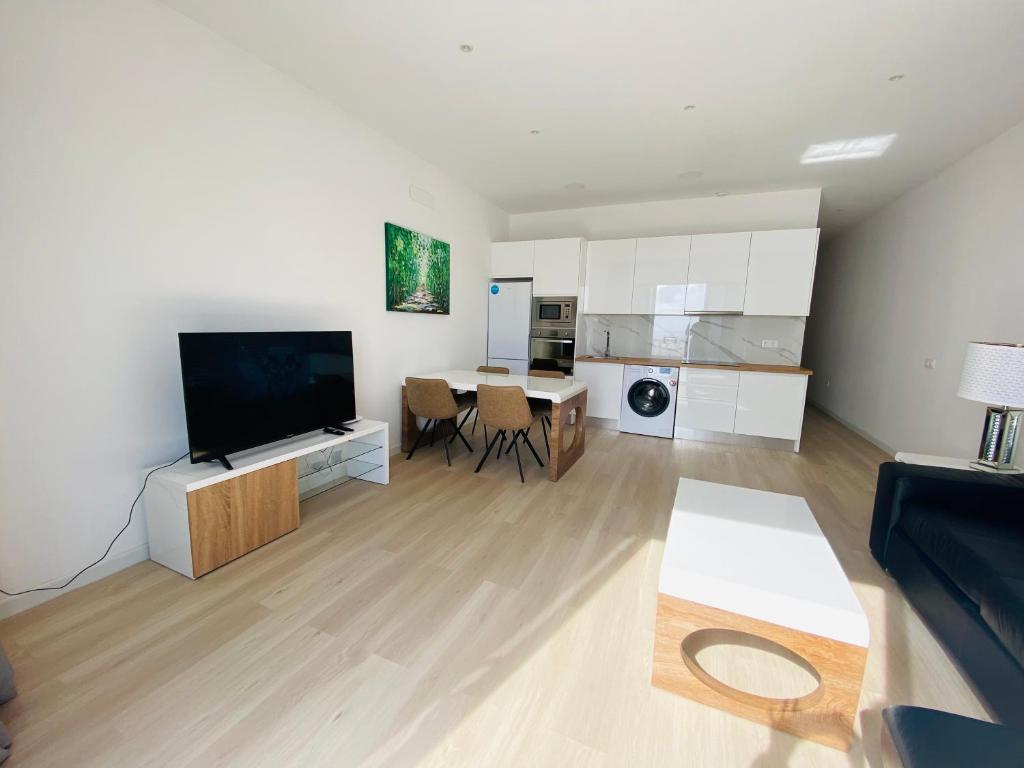 Kuchyň nebo kuchyňský kout v ubytování Atlántico Plaza Apartments