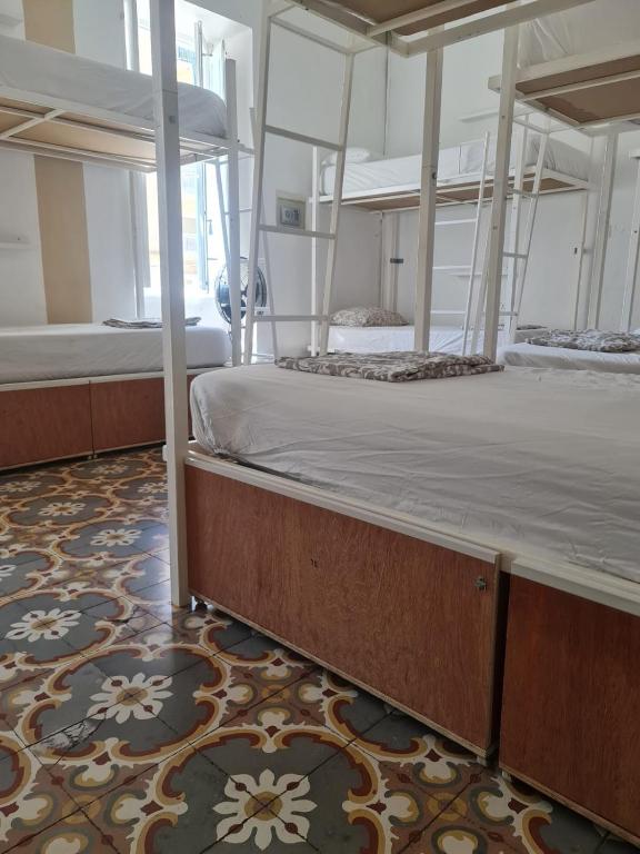 Postel nebo postele na pokoji v ubytování Hostel On
