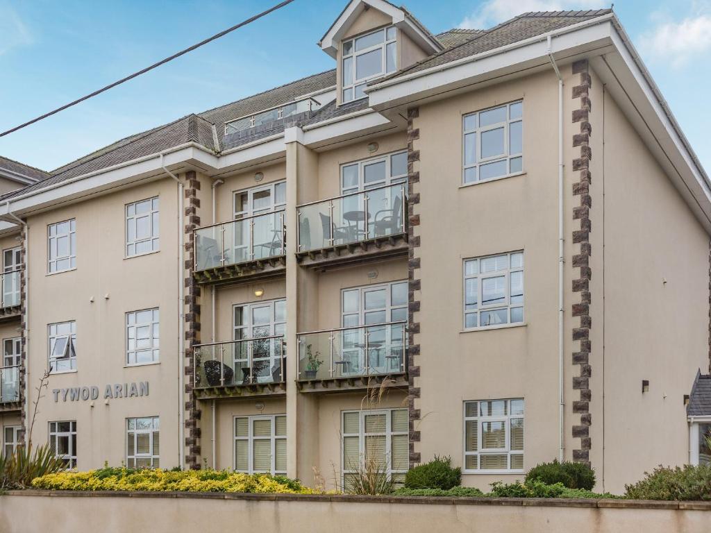 an apartment building with balconies and condos at The Penthouse in Morfa Nefyn