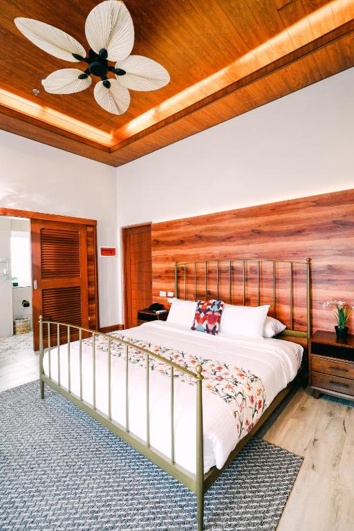 Postel nebo postele na pokoji v ubytování Hotel Kimberly Tagaytay