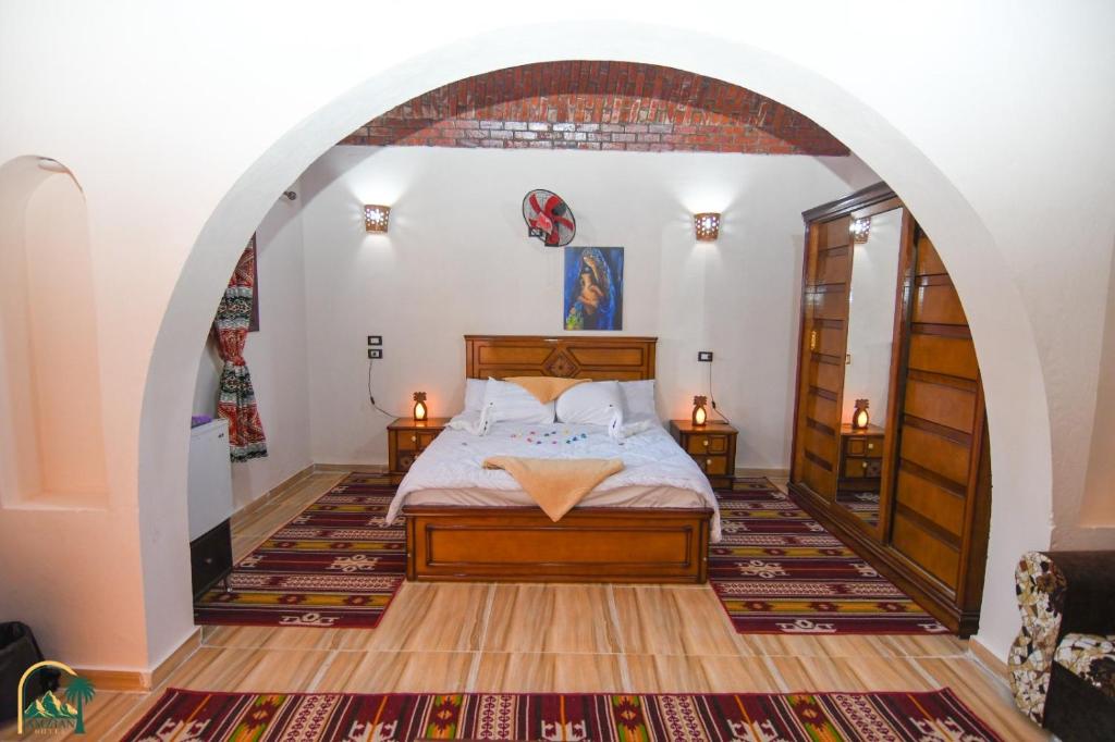 Postel nebo postele na pokoji v ubytování amzran hotel siwa