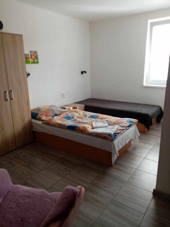 Postel nebo postele na pokoji v ubytování Ivachnová 84