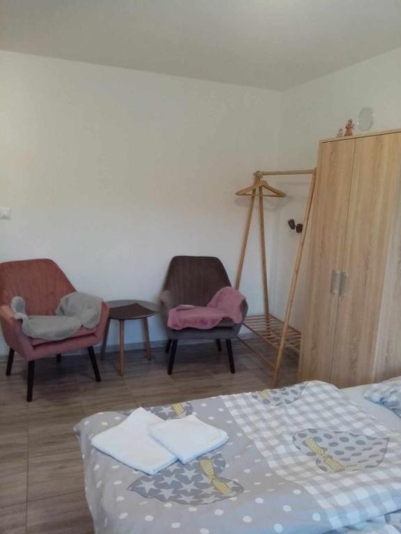 Postel nebo postele na pokoji v ubytování Ivachnová 84