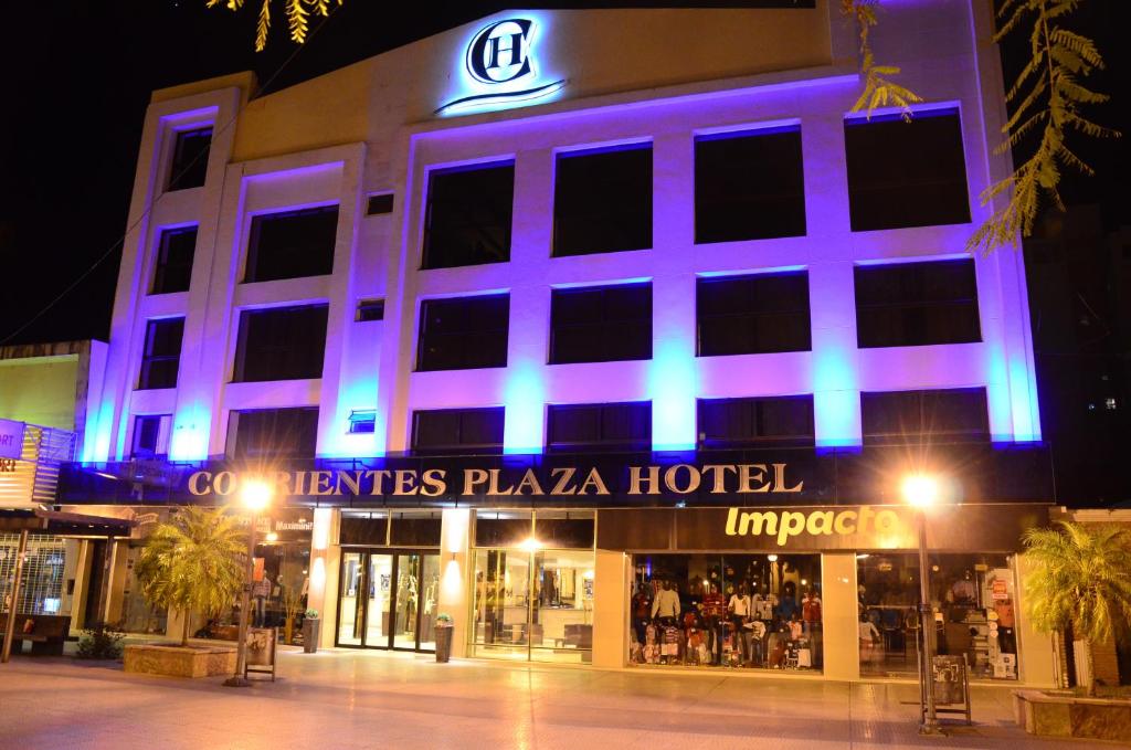 a large building with a clock on the front of it at Corrientes Plaza Hotel in Corrientes