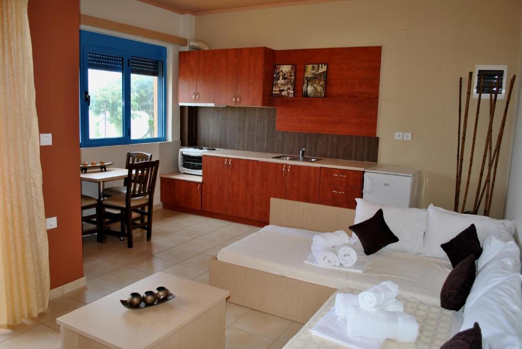 Χώρος καθιστικού στο Iliovasilema Hotel