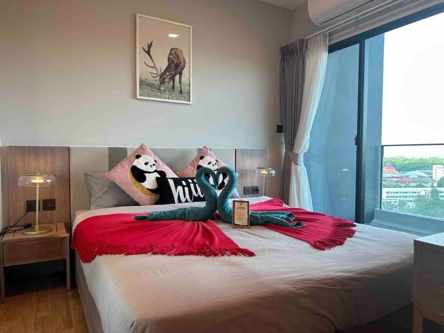 Postel nebo postele na pokoji v ubytování Astra sky river High floor,3 bedrooms 97㎡ 山景房带浴缸