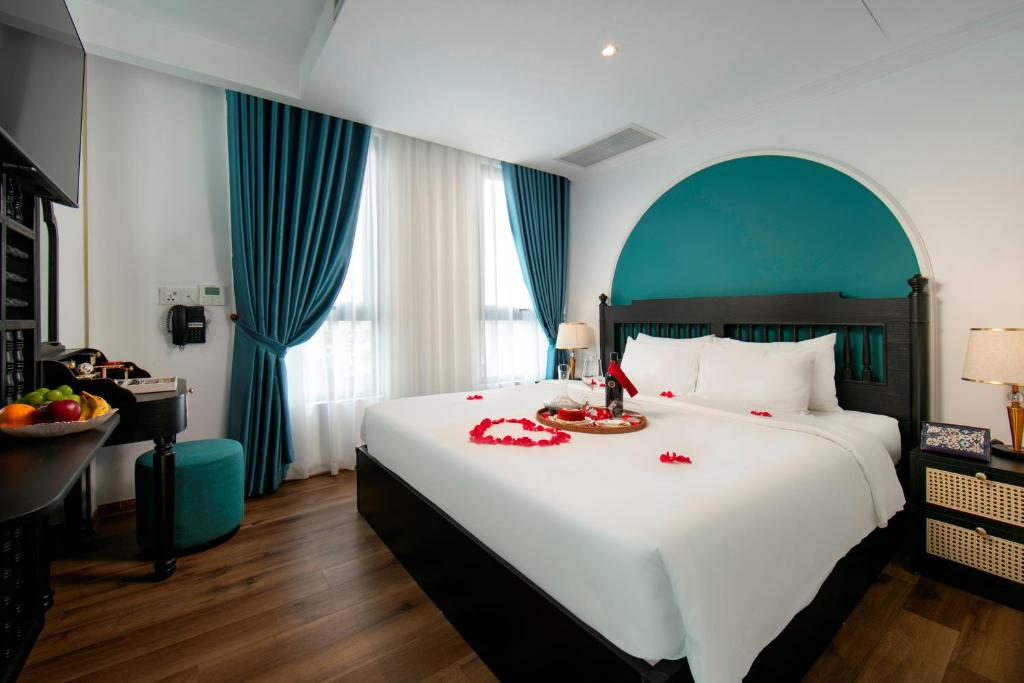 Postel nebo postele na pokoji v ubytování Hotel De Rond