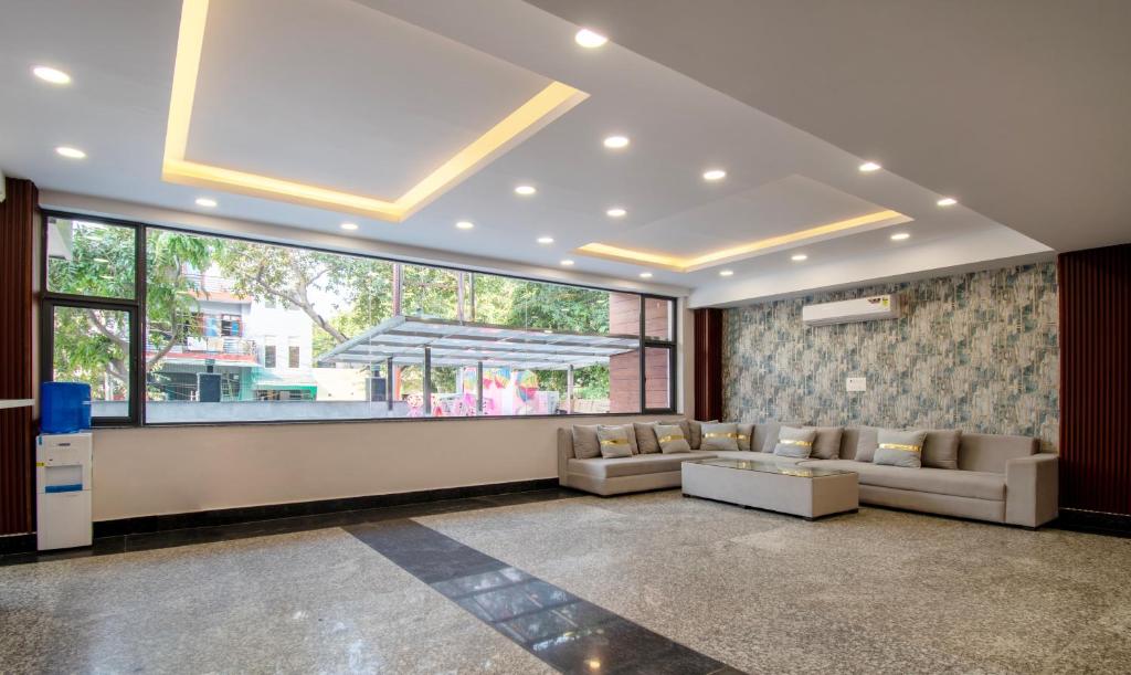 Posezení v ubytování Treebo La Mirage Suite