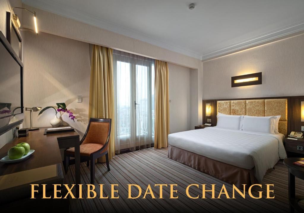 Postel nebo postele na pokoji v ubytování Silk Path Hotel Hanoi