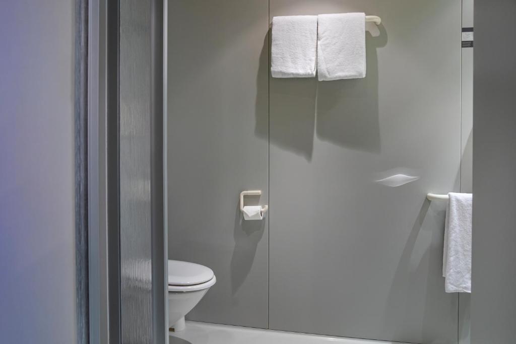 Koupelna v ubytování Roomingtons Lüneburger Heide