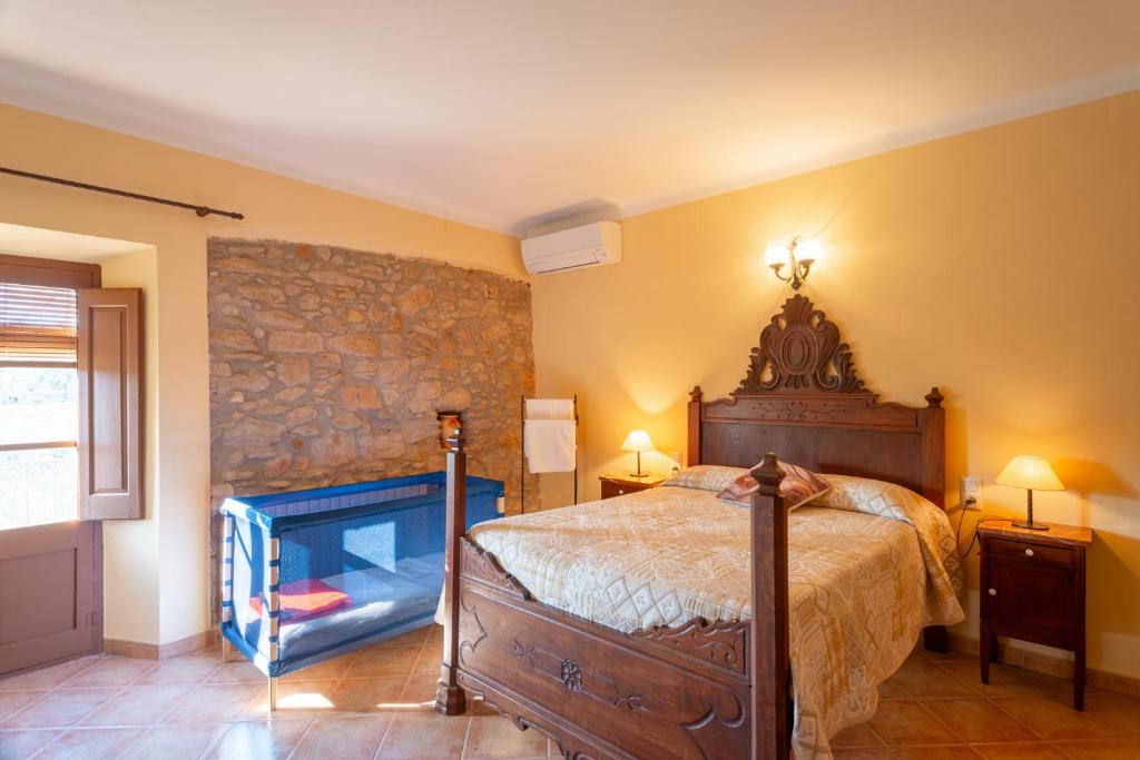 Postel nebo postele na pokoji v ubytování Mas dels Frares
