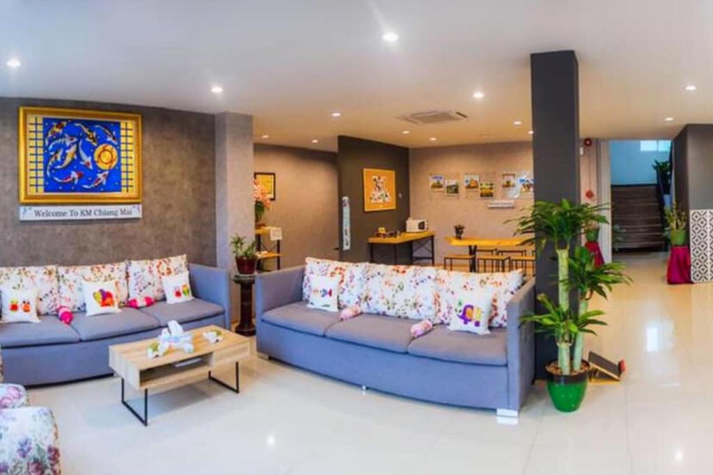 Posezení v ubytování Km Hotel Chiang Mai