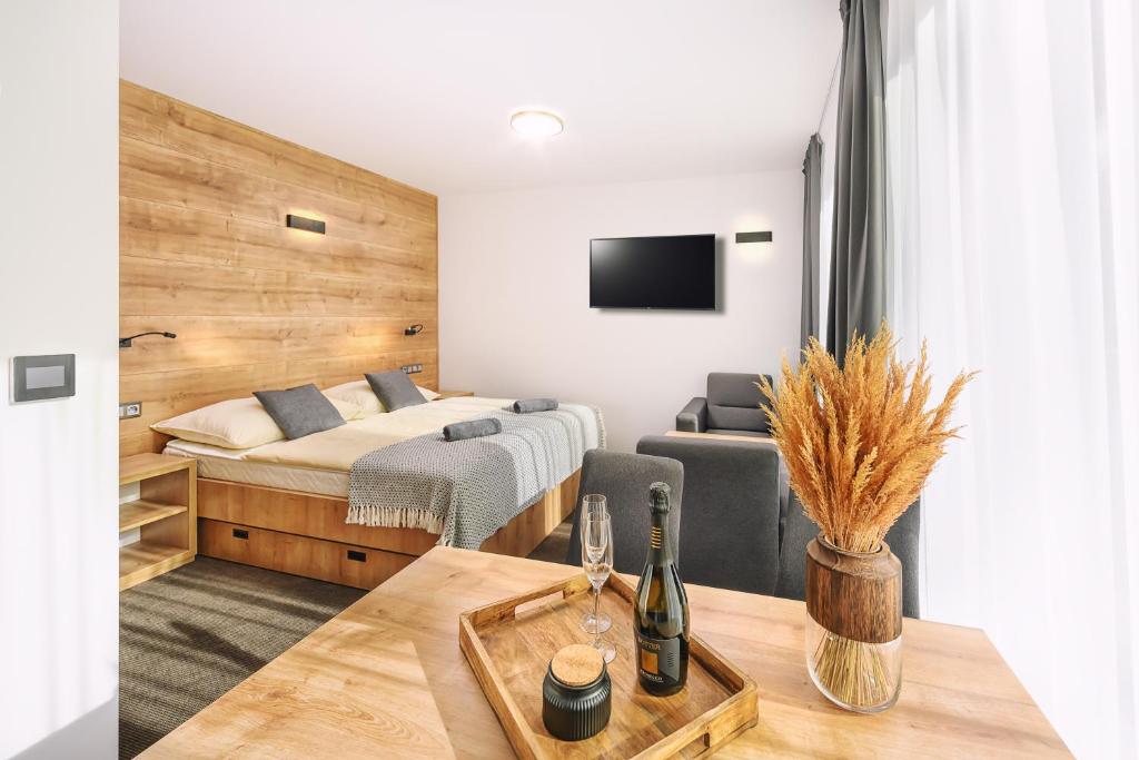 Postel nebo postele na pokoji v ubytování Resort Lucky Jasna