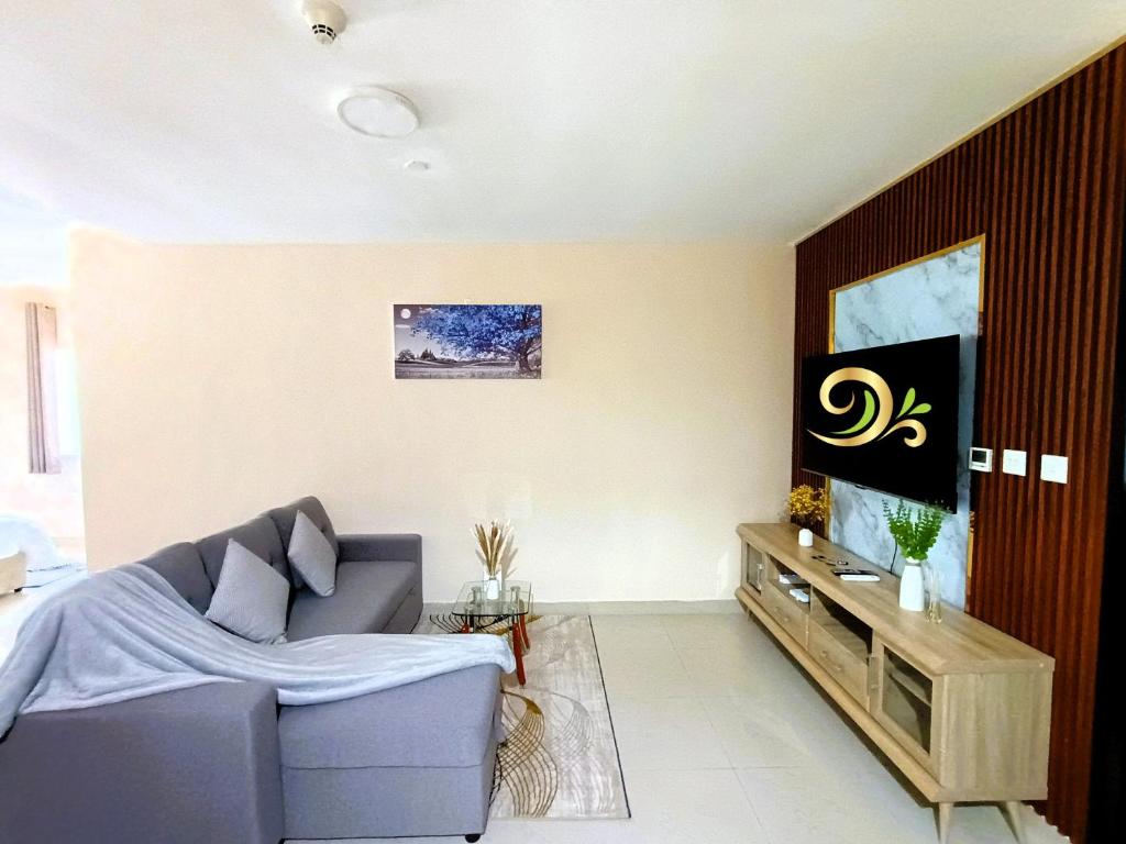 Χώρος καθιστικού στο Spacious Studio apartment in the Heart of JLT