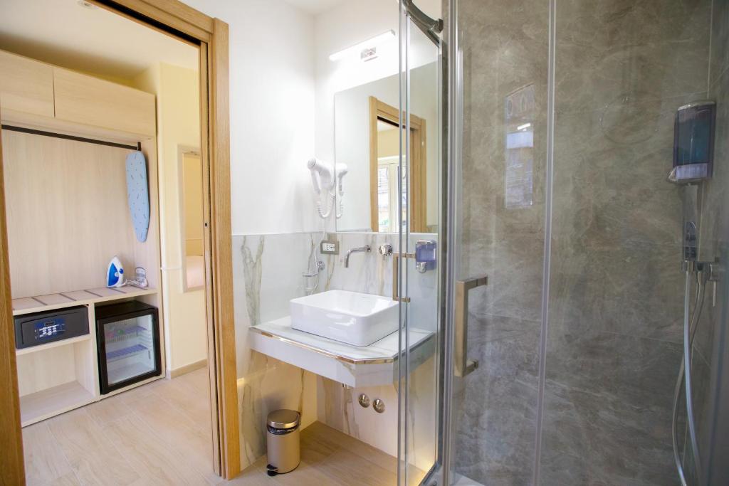 Koupelna v ubytování Hotel Maximus