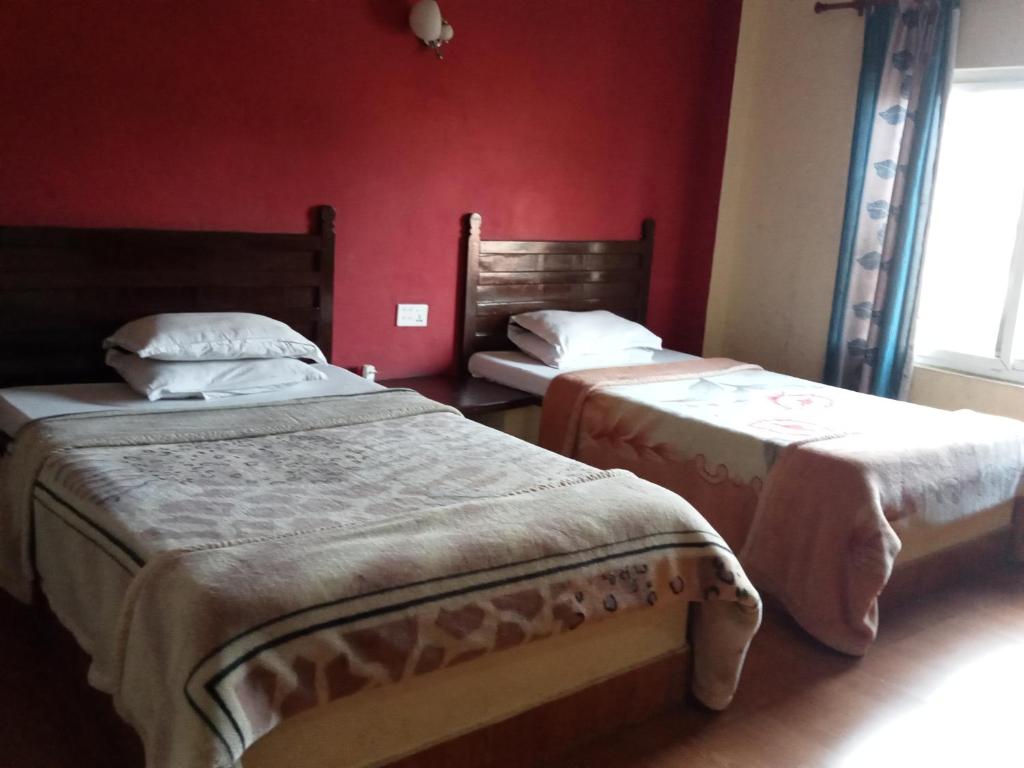 Postel nebo postele na pokoji v ubytování Hotel Holidays Inn - Bagpacker's Home