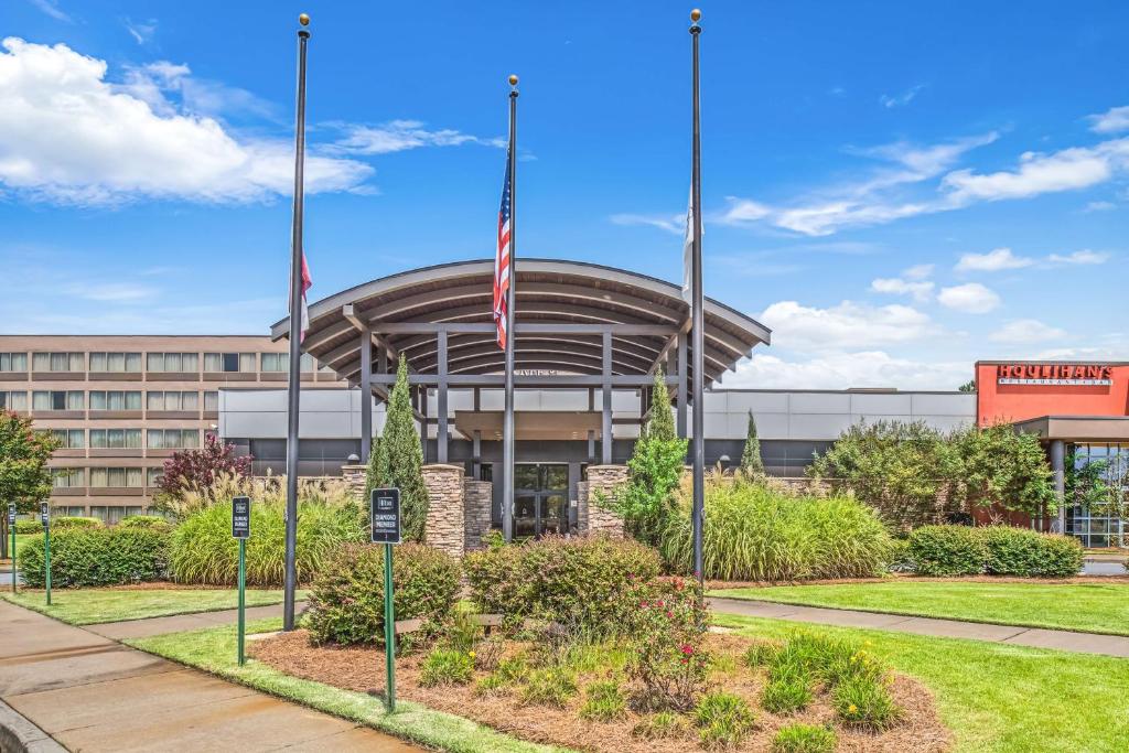 a building with two flags in front of it at DoubleTree by Hilton Columbus in Columbus