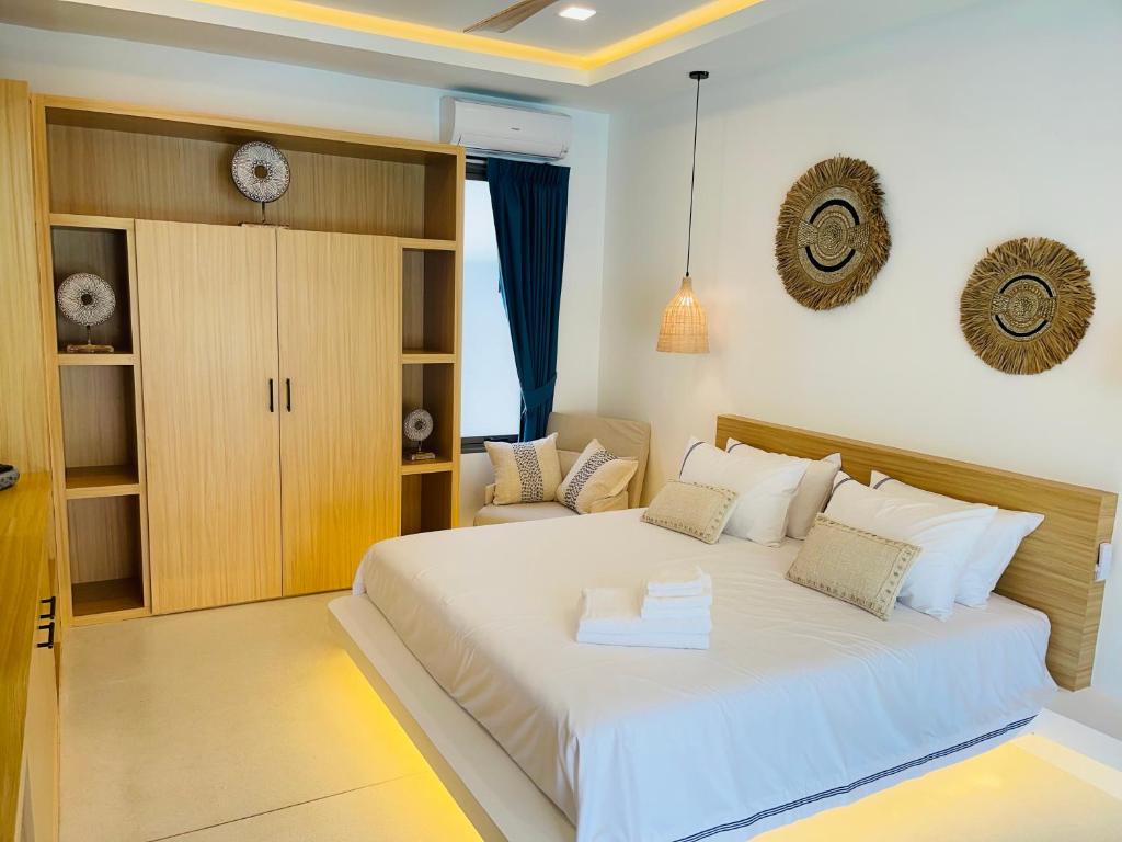Postel nebo postele na pokoji v ubytování Yuka residence
