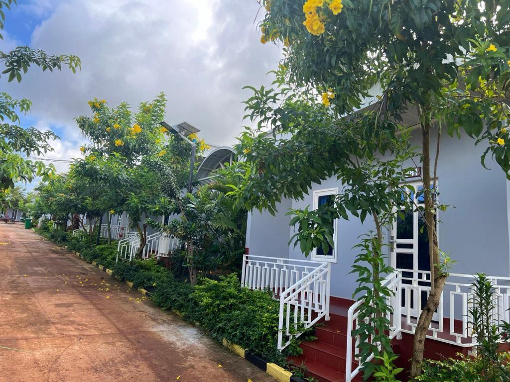 a house on the side of a road at Chomkatae Bungalows in Sen Monorom