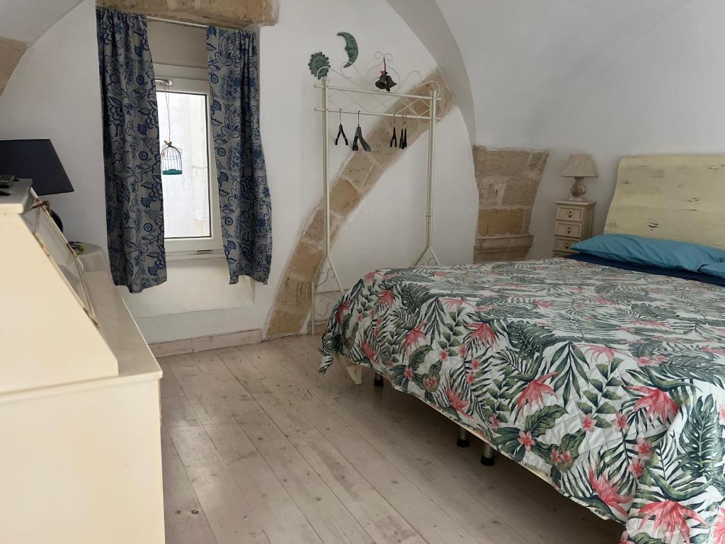 A bed or beds in a room at Handy Margherita