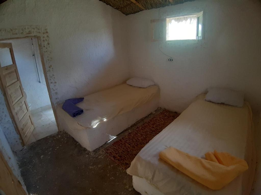 Postel nebo postele na pokoji v ubytování M Biama Island
