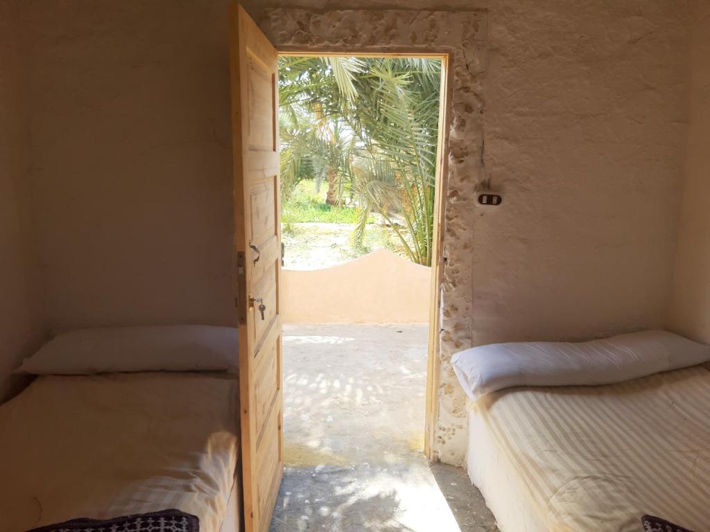 Postel nebo postele na pokoji v ubytování M Biama Island