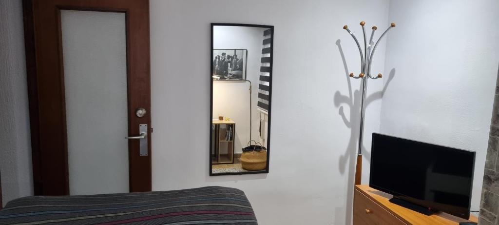 TV a/nebo společenská místnost v ubytování Private Room Valencia Center