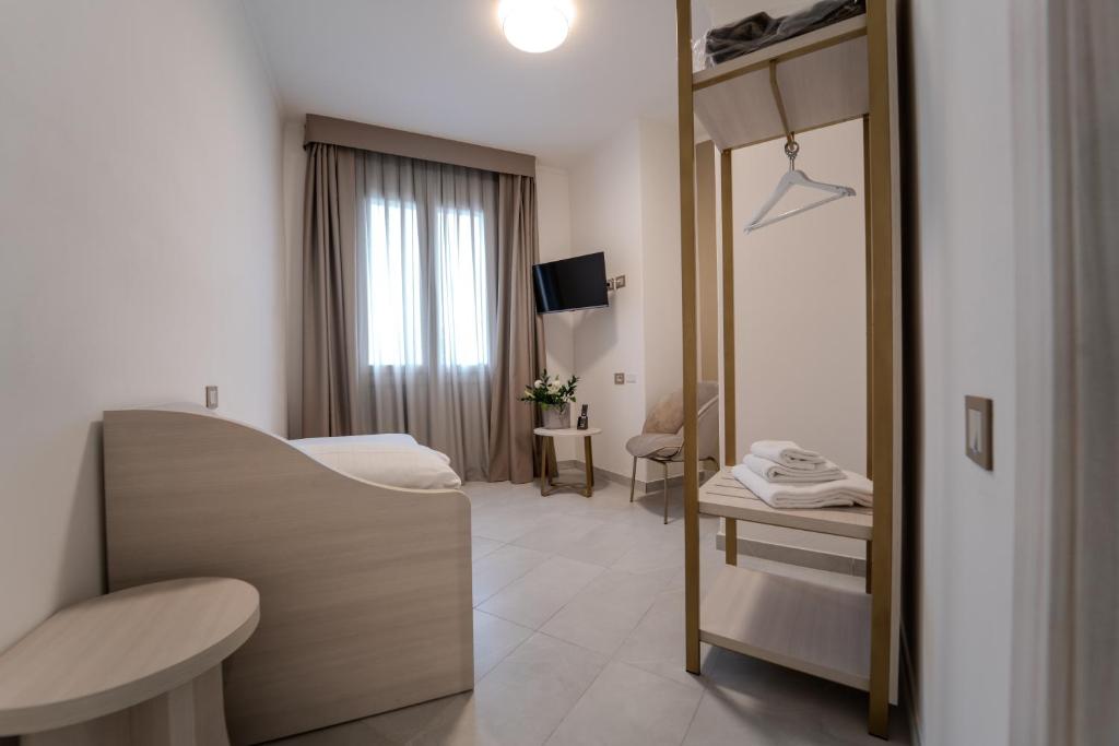 TV a/nebo společenská místnost v ubytování Hotel Donatello