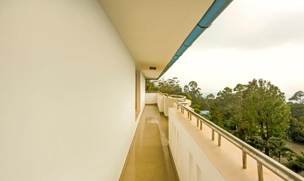 Fotografie z fotogalerie ubytování Itsy Hotels Classiyo Munnar Crown Resorts With Balcony v destinaci Munnar