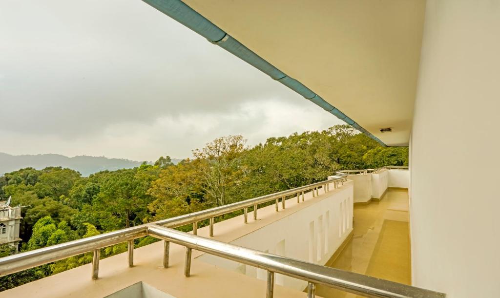 Fotografie z fotogalerie ubytování Itsy Hotels Classiyo Munnar Crown Resorts With Balcony v destinaci Munnar