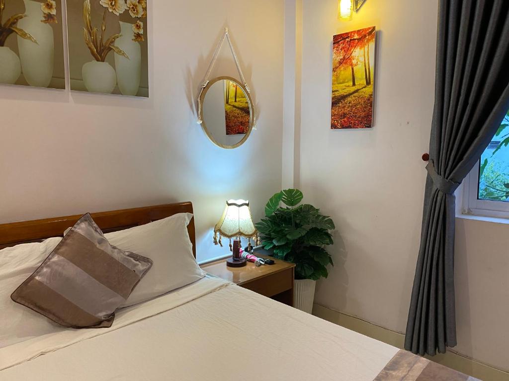 Postel nebo postele na pokoji v ubytování Bonjour Hostel