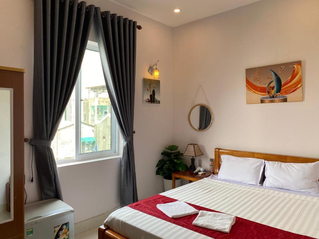 Postel nebo postele na pokoji v ubytování Bonjour Hostel