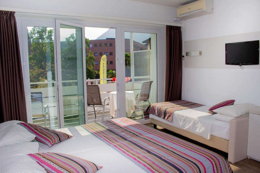 Cama o camas de una habitación en Colorado Hotel