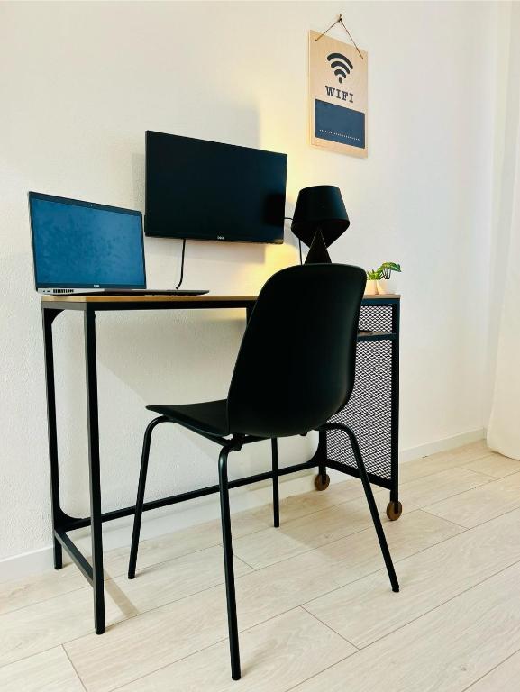 TV a/nebo společenská místnost v ubytování Design Moderno in Centro - Lainate- Rho Fiera