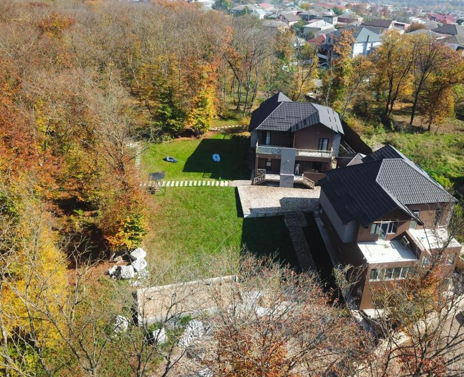 an aerial view of a house with a yard at CHALET WOODS GUSAR in Qusar