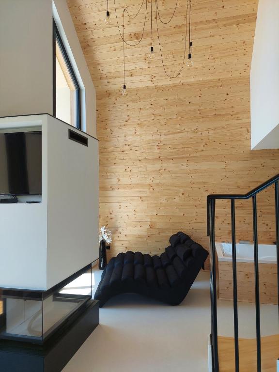 Postel nebo postele na pokoji v ubytování HERBALIJA Apartment Amalija - in the embrace of wellbeing
