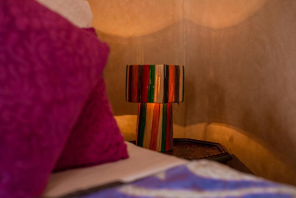 Postel nebo postele na pokoji v ubytování Riad Le Jardin de Lea, Suites & Spa